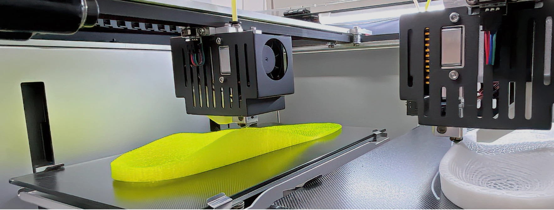 Two print heads forming custom orthotics